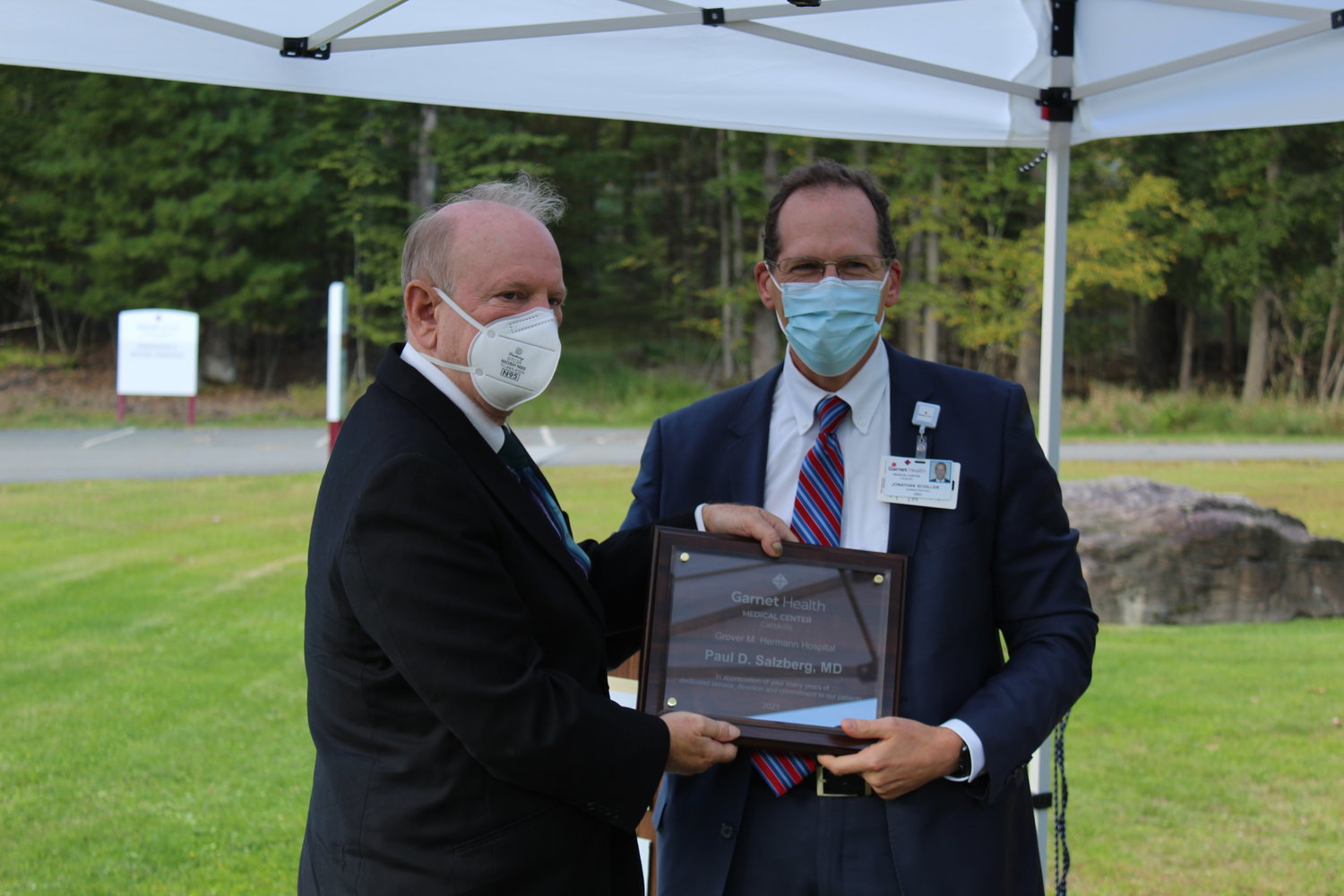 Dr. Paul Salzberg, left, and Garnet Health CEO Jonathan Schiller at the September 29 ceremony.